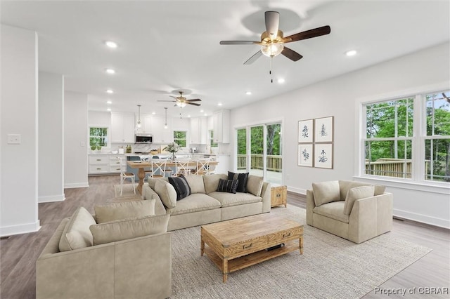 8280 Mobjack Ln, Hayes, VA 23072 - living room with recessed lighting and a wealth of natural light