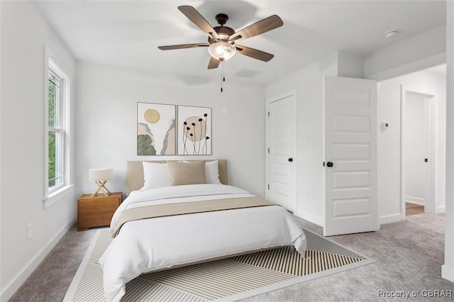 8280 Mobjack Ln, Hayes, VA 23072 - carpeted bedroom featuring baseboards and ceiling fan