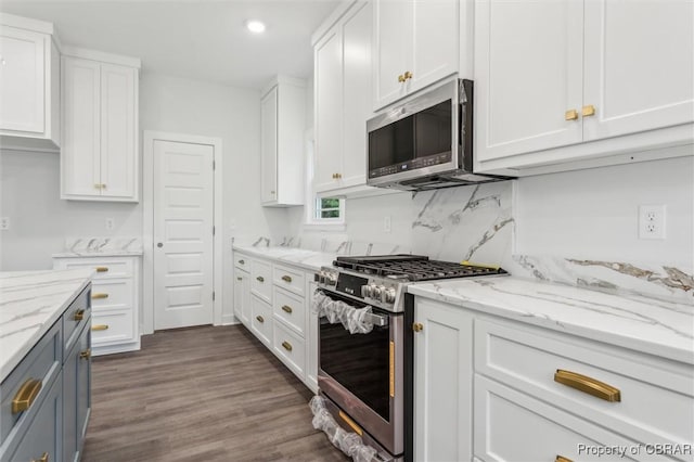 8280 Mobjack Ln, Hayes, VA 23072 - kitchen featuring white cabinets and appliances with stainless steel finishes