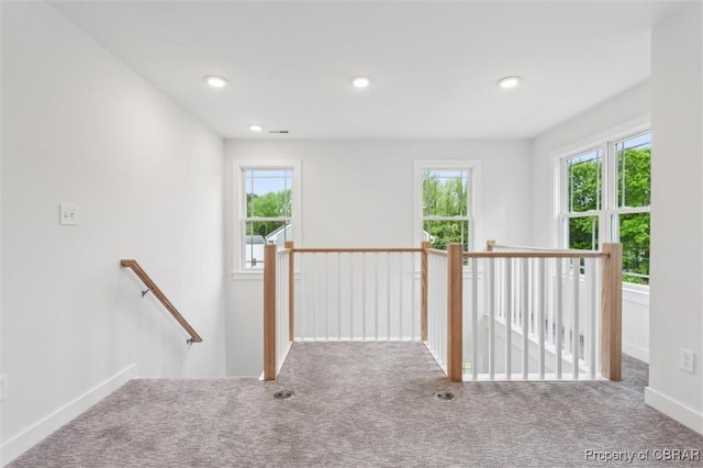 8280 Mobjack Ln, Hayes, VA 23072 - hall featuring an upstairs landing, carpet floors, and baseboards