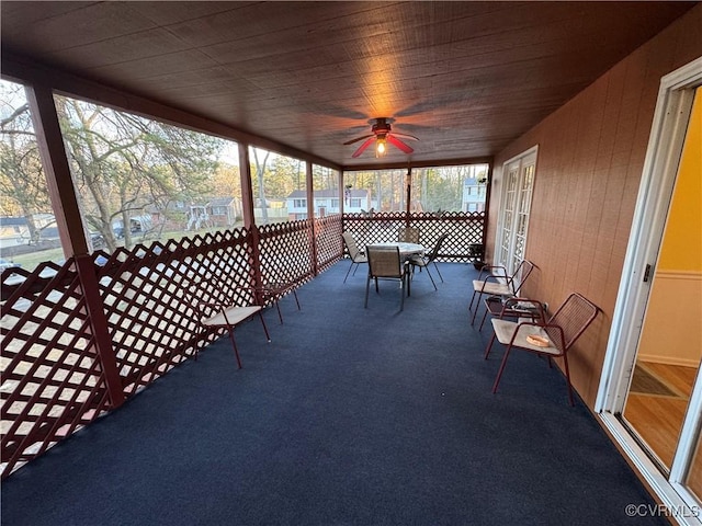 unfurnished sunroom featuring plenty of natural light