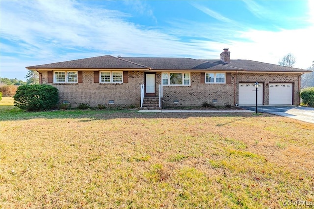 ranch-style house with a garage and a front yard