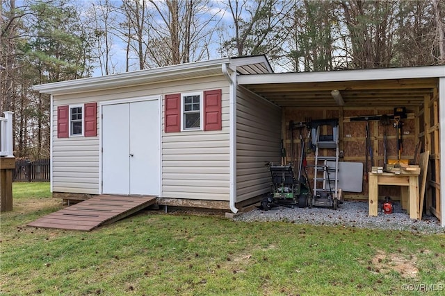 view of outdoor structure featuring a yard