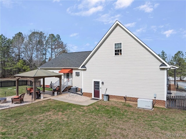 back of house featuring a gazebo, a patio, cooling unit, and a lawn