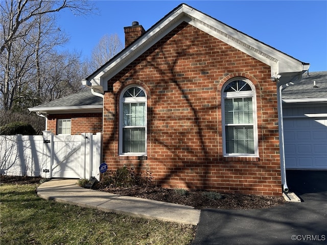 3238 Stone Manor Cir, Chester, VA 23831 - view of side of property featuring a garage