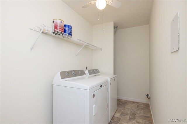 laundry room featuring washer and dryer and ceiling fan