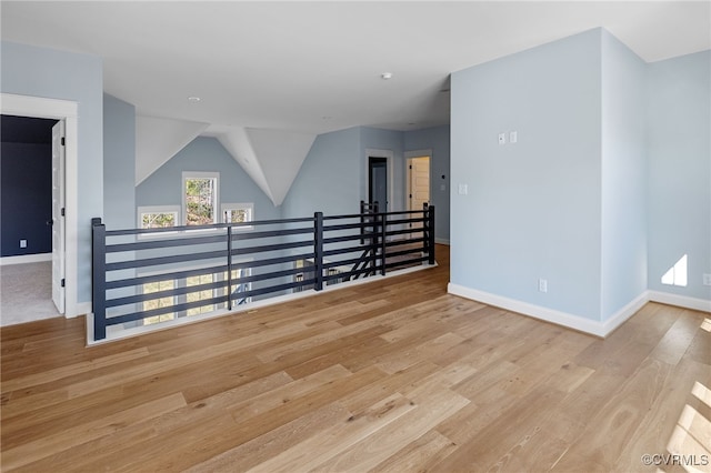 spare room with light hardwood / wood-style flooring