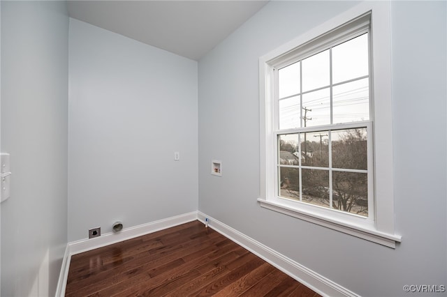 washroom featuring laundry area, dark wood-style flooring, electric dryer hookup, baseboards, and hookup for a washing machine
