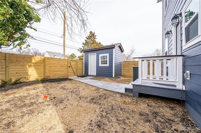 exterior space featuring an outbuilding and a deck