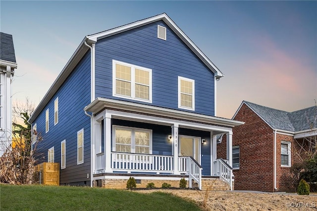 traditional-style home with a porch