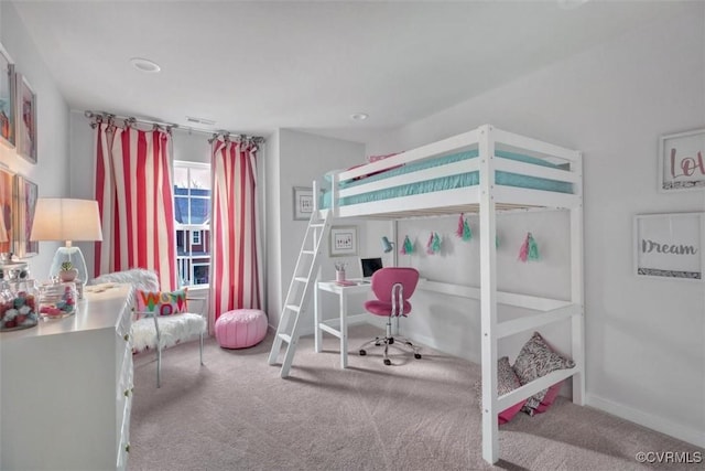 bedroom featuring light colored carpet