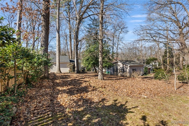 view of yard with fence