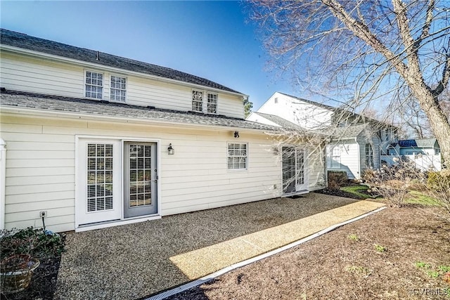 rear view of house featuring a patio