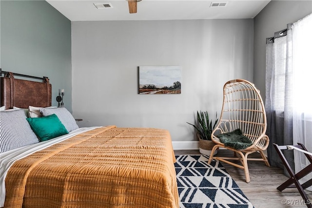 bedroom featuring wood-type flooring