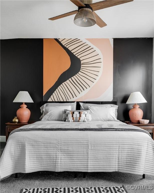 carpeted bedroom featuring ceiling fan