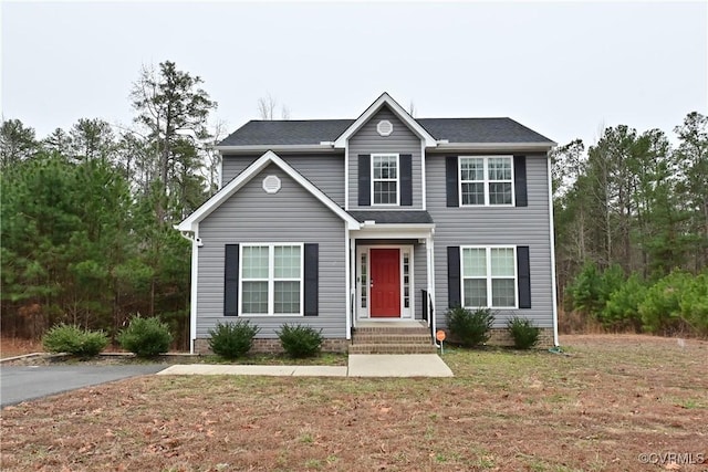 view of front of house with a front yard