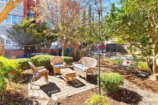 view of patio featuring fence