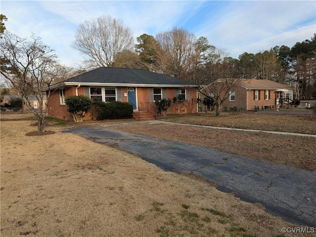 ranch-style home with brick siding