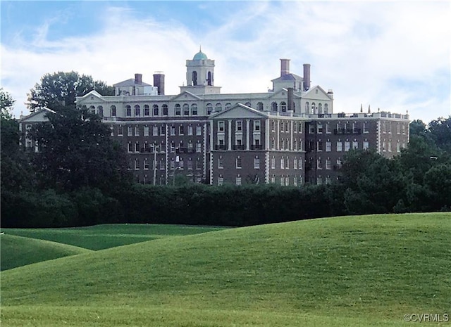 view of community with a lawn