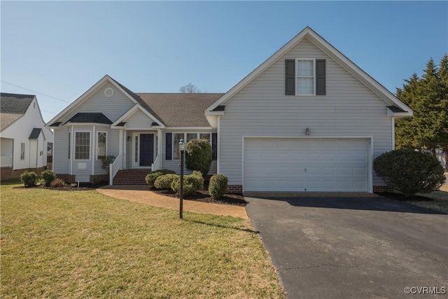 traditional-style home featuring an attached garage, driveway, and a front yard