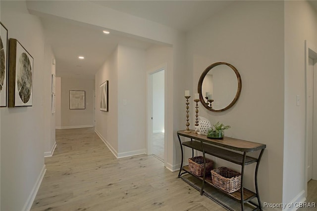 hallway with light wood-type flooring