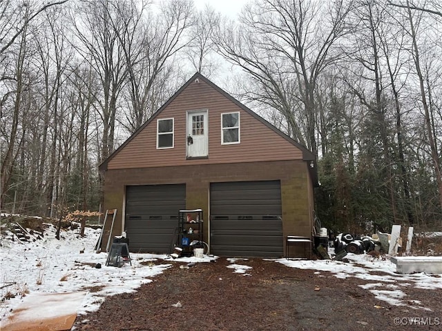 view of snow covered garage