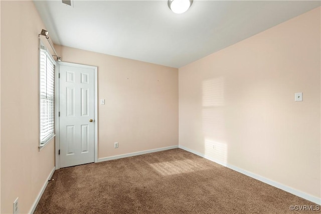 spare room with carpet flooring