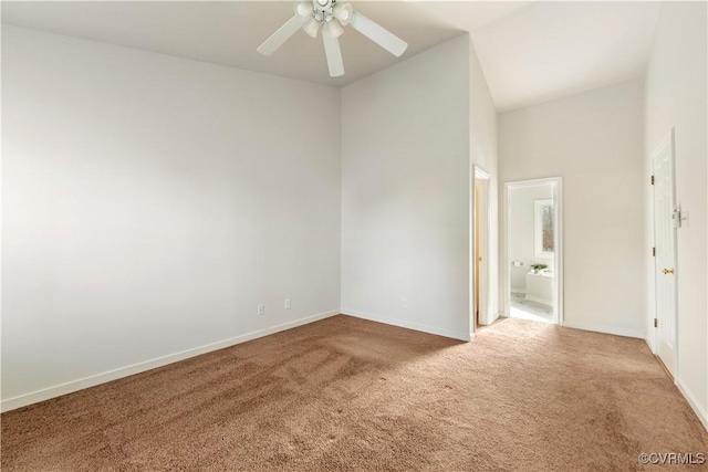 carpeted empty room with ceiling fan