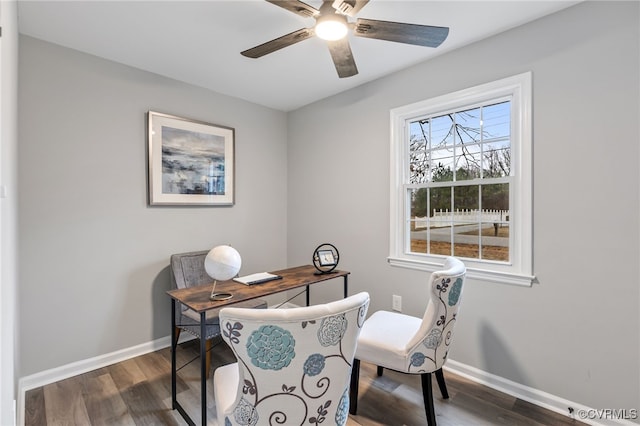 office featuring dark wood-type flooring and ceiling fan