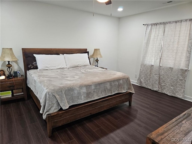 bedroom with recessed lighting, wood finished floors, a ceiling fan, and baseboards