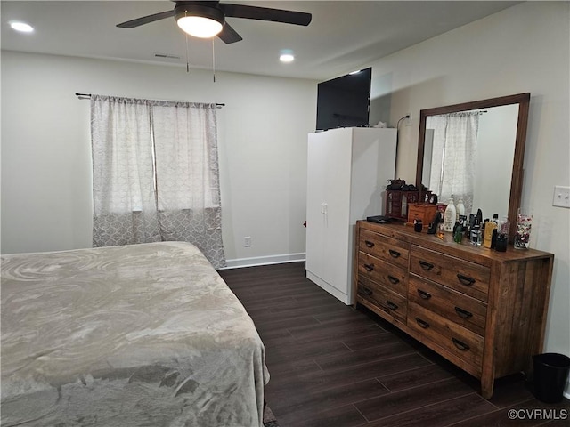 bedroom with recessed lighting, visible vents, dark wood-type flooring, baseboards, and ceiling fan