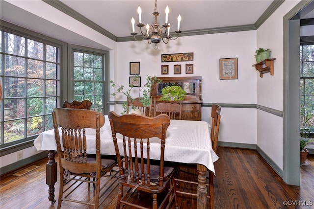 dining area featuring a chandelier, visible vents, baseboards, dark wood-style floors, and crown molding