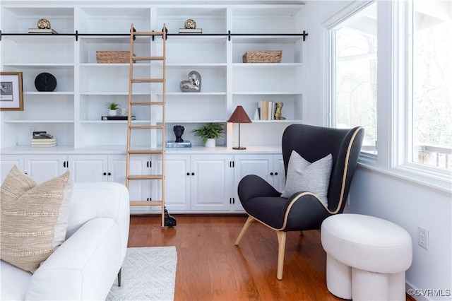 living area with light wood-style floors