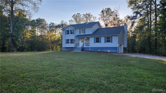 view of front of home featuring a front yard