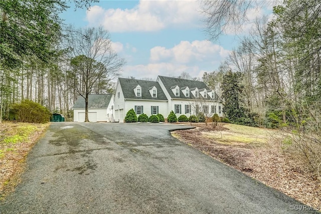 view of front facade with driveway and a garage