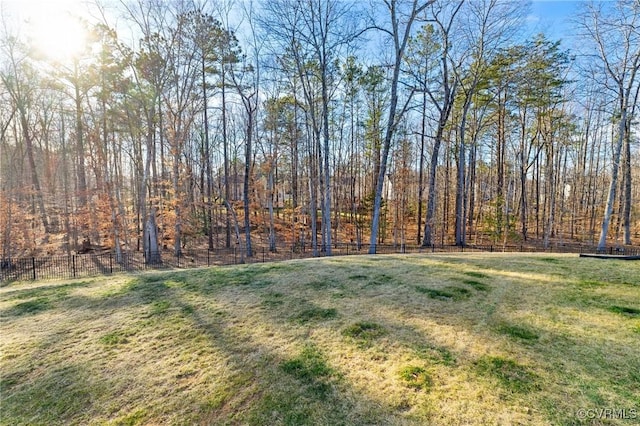 view of yard with fence