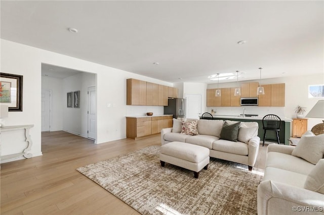 living area with light wood-type flooring