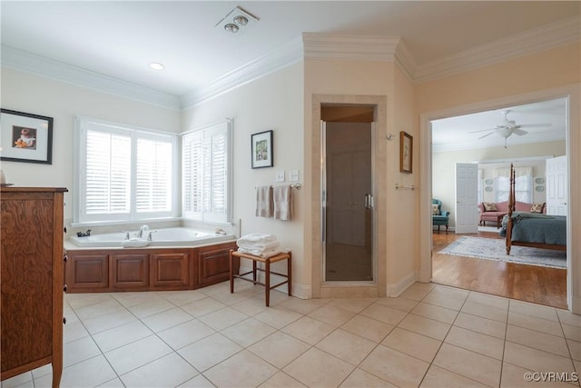 full bathroom with ensuite bathroom, ornamental molding, a shower stall, tile patterned flooring, and a bath