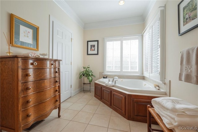 full bathroom with tile patterned flooring, a garden tub, visible vents, baseboards, and ornamental molding