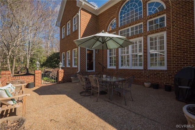 view of patio featuring a grill