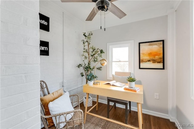 office space with dark wood-type flooring, ceiling fan, and baseboards