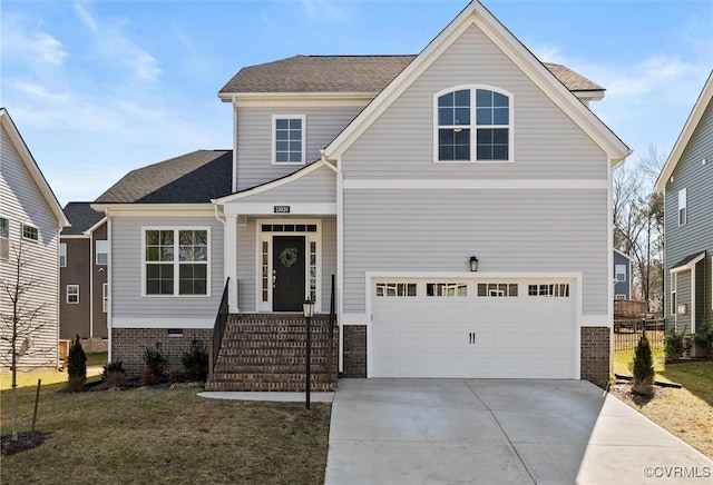 view of front of property featuring a garage and a front yard