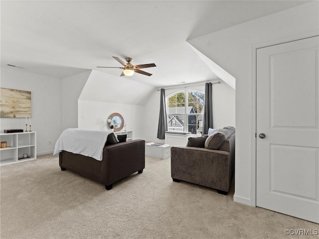 bedroom with visible vents, baseboards, light colored carpet, lofted ceiling, and ceiling fan