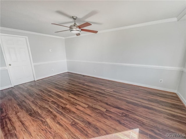 empty room with dark wood-type flooring, ornamental molding, and ceiling fan