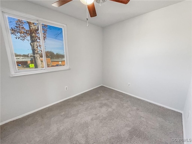 unfurnished room featuring carpet floors and ceiling fan