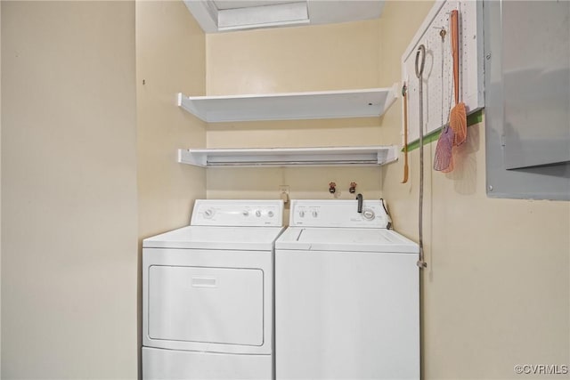 washroom featuring independent washer and dryer