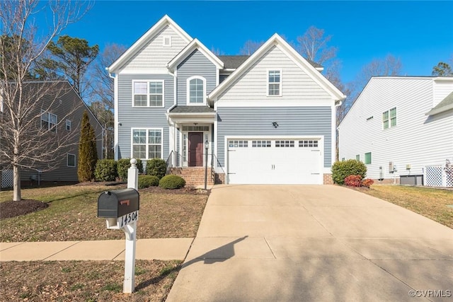 front of property with a garage and a front yard