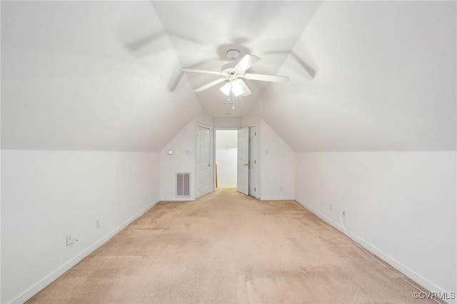 bonus room featuring light carpet, vaulted ceiling, and ceiling fan