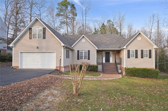 view of front facade featuring a garage and a front lawn