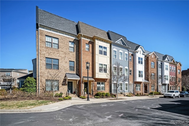 view of property with a residential view